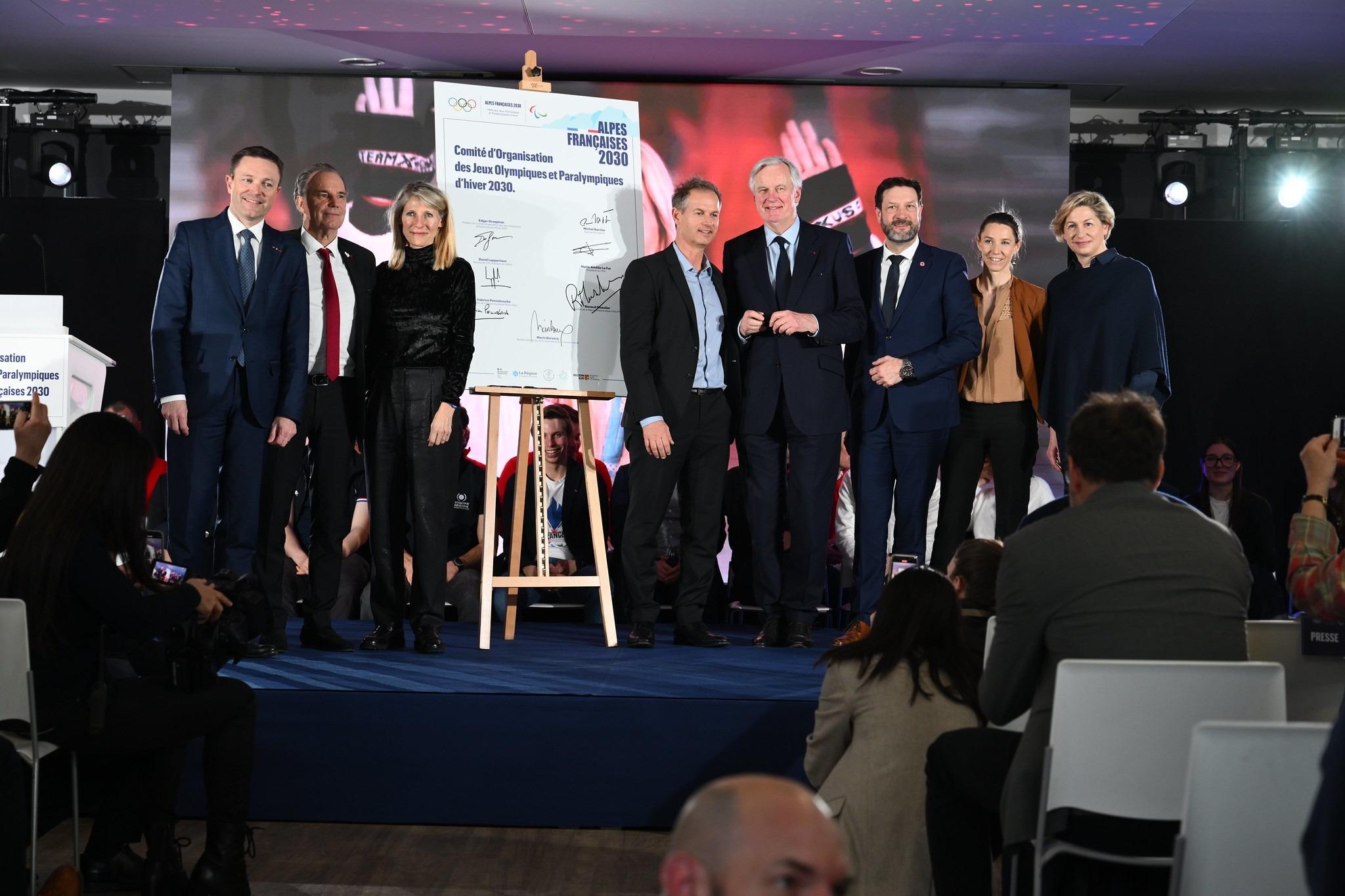 Assemblée générale du Comité d’Organisation des Jeux Olympiques et Paralympiques avec Marie Barsacq, Edgar Grospiron et Michel Barnier